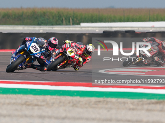 Bradley Ray from the United Kingdom of the Yamaha Motoracing World SBK Team rides a Yamaha YZF R1, followed by Alvaro Bautista from Spain of...