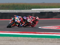 Michael Ruben Rinaldi from Italy of Team Motocorsa Racing rides a Ducati Panigale V4R, followed by Nicolo Bulega from Italy of Aruba.it Duca...