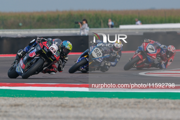 Tito Rabat from Spain of Kawasaki Puccetti Racing rides a Kawasaki ZX-10RR, followed by Alessandro Delbianco from Italy of Yamaha Motoxracin...