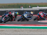 Tito Rabat from Spain of Kawasaki Puccetti Racing rides a Kawasaki ZX-10RR, followed by Alessandro Delbianco from Italy of Yamaha Motoxracin...