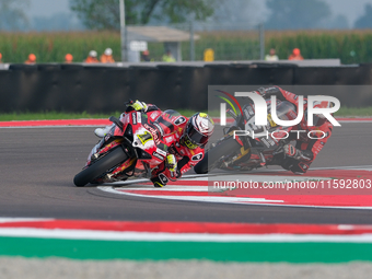 Alvaro Bautista from Spain of the Aruba.it Ducati Team rides a Ducati Panigale V4R, followed by Danilo Petrucci from Italy of the Brani Spar...