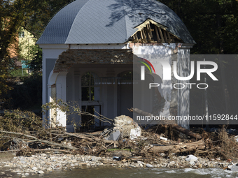 A chapel damaged by the flood wave sits amongst debries next to the Morawka river in Stronie Slaskie, Poland on September 21, 2024. (