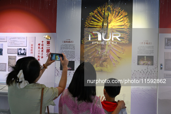 Visitors visit the Sign Language Museum at the Nanjing School for the Deaf in Nanjing, China, on September 21, 2024. 