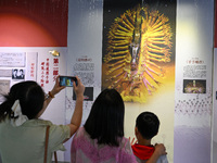 Visitors visit the Sign Language Museum at the Nanjing School for the Deaf in Nanjing, China, on September 21, 2024. (