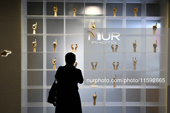 Visitors visit the Sign Language Museum at the Nanjing School for the Deaf in Nanjing, China, on September 21, 2024. 