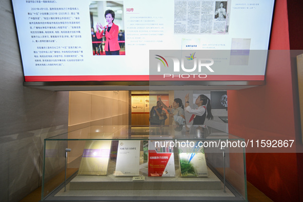 Visitors visit the Sign Language Museum at the Nanjing School for the Deaf in Nanjing, China, on September 21, 2024. 