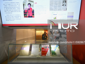 Visitors visit the Sign Language Museum at the Nanjing School for the Deaf in Nanjing, China, on September 21, 2024. (