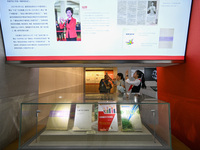 Visitors visit the Sign Language Museum at the Nanjing School for the Deaf in Nanjing, China, on September 21, 2024. (