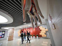 Visitors visit the Sign Language Museum at the Nanjing School for the Deaf in Nanjing, China, on September 21, 2024. (