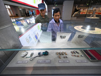 Visitors visit the Sign Language Museum at the Nanjing School for the Deaf in Nanjing, China, on September 21, 2024. (