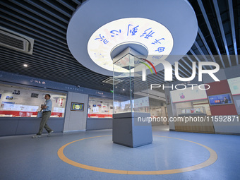 Visitors visit the Sign Language Museum at the Nanjing School for the Deaf in Nanjing, China, on September 21, 2024. (