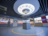 Visitors visit the Sign Language Museum at the Nanjing School for the Deaf in Nanjing, China, on September 21, 2024. (