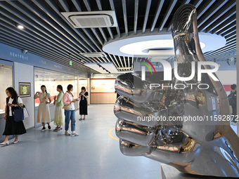 Visitors visit the Sign Language Museum at the Nanjing School for the Deaf in Nanjing, China, on September 21, 2024. (