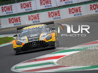 Cesar Gazeau, Roee Meyuhas, and Aurelien Panis of team Boutsen VDS stand by a Mercedes-AMG GT3 EVO GT car on a pit lane during the Fanatec G...