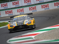 Cesar Gazeau, Roee Meyuhas, and Aurelien Panis of team Boutsen VDS stand by a Mercedes-AMG GT3 EVO GT car on a pit lane during the Fanatec G...