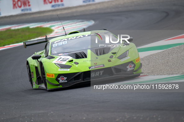 Mateo Llarena, Baptiste Moulin, and Artem Petrov of the GRT - Grasser Racing Team stand next to a Lamborghini Huracan GT3 EVO2 GT car on a p...