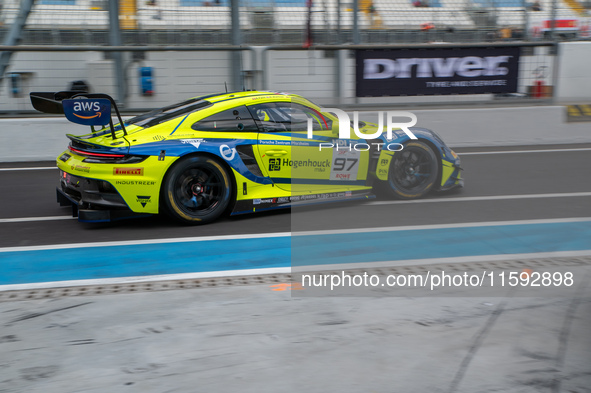 Dennis Marschall, Alexander Fach, and Dustin Blattner of the Rutronik Racing team drive a Porsche 911 GT3 R (992) during a Fanatec GT World...