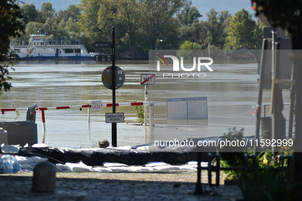 The ferry terminal floods on the bank of the Danube in Vac, about 42km from Budapest, as the peak water levels of the Danube are expected to...