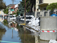 Houses are protected by sandbags on the bank of the Danube in Vac, Hungary, about 42 km from Budapest, as the peak water levels of the Danub...