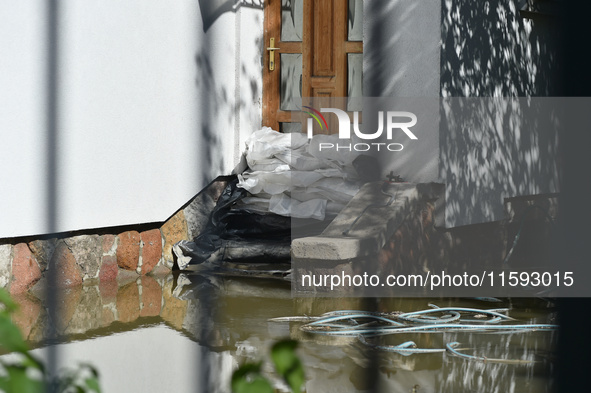 A door is barricaded by sandbags on the bank of the Danube in Vac, Hungary, about 42 km from Budapest, as the peak water levels of the Danub...