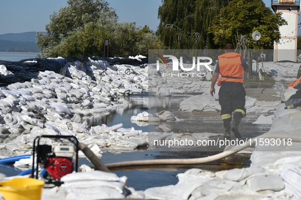 Sandbags serve as a flood barrier on the bank of the Danube in Vac, Hungary, about 42 km from Budapest, as the peak water levels of the Danu...