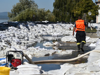 Sandbags serve as a flood barrier on the bank of the Danube in Vac, Hungary, about 42 km from Budapest, as the peak water levels of the Danu...