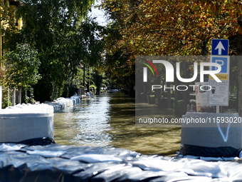 A street is completely flooded on the bank of the Danube in Vac, Hungary, about 42km from Budapest, as the peak water levels of the Danube a...