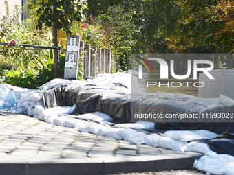 Sandbags are in front of houses on the bank of the Danube in Vac, Hungary, about 42 km from Budapest, as the peak water levels of the Danube...