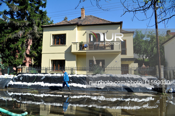 A house is protected by sandbags on the bank of the Danube in Vac, Hungary, about 42km from Budapest, as the peak water levels of the Danube...