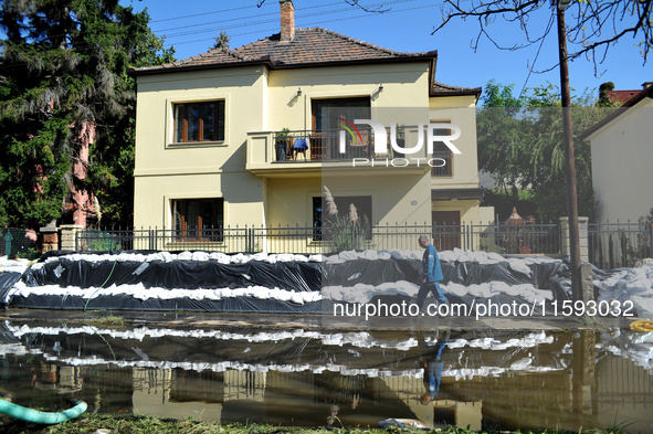 A house is protected by sandbags on the bank of the Danube in Vac, Hungary, about 42km from Budapest, as the peak water levels of the Danube...