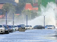 Big waves hit vehicles on Binhai North Road in Yantai, Shandong province, China, on September 21, 2024. (