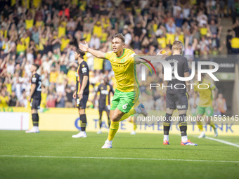 Callum Doyle of Norwich City celebrates scoring their first goal during the Sky Bet Championship match between Norwich City and Watford at C...