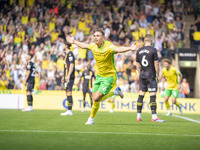 Callum Doyle of Norwich City celebrates scoring their first goal during the Sky Bet Championship match between Norwich City and Watford at C...