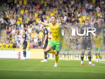 Callum Doyle of Norwich City celebrates scoring their first goal during the Sky Bet Championship match between Norwich City and Watford at C...