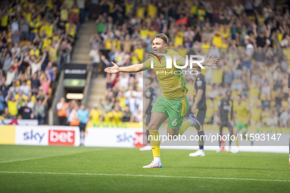 Callum Doyle of Norwich City celebrates scoring their first goal during the Sky Bet Championship match between Norwich City and Watford at C...