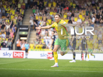 Callum Doyle of Norwich City celebrates scoring their first goal during the Sky Bet Championship match between Norwich City and Watford at C...