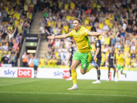 Callum Doyle of Norwich City celebrates scoring their first goal during the Sky Bet Championship match between Norwich City and Watford at C...