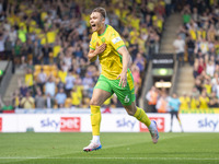 Callum Doyle of Norwich City celebrates scoring their first goal during the Sky Bet Championship match between Norwich City and Watford at C...