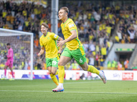 Callum Doyle of Norwich City celebrates scoring their first goal during the Sky Bet Championship match between Norwich City and Watford at C...