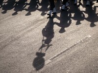 Members of the Iranian Army's land force march in a military parade commemorating the anniversary of the Iran-Iraq War (1980-88) outside the...