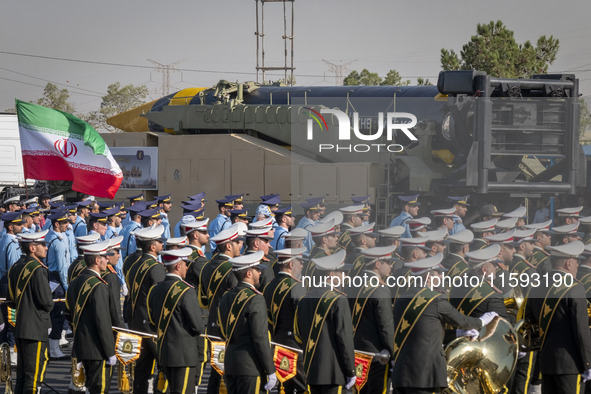 An Iranian Khoramshahr ballistic missile is carried by a truck during a military parade commemorating the anniversary of the Iran-Iraq War (...