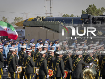 An Iranian Khoramshahr ballistic missile is carried by a truck during a military parade commemorating the anniversary of the Iran-Iraq War (...