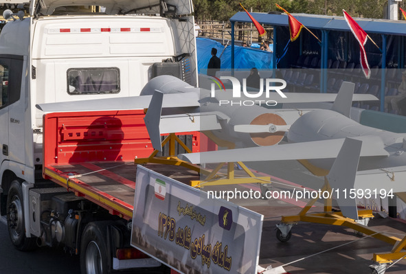 Iranian-made unmanned aerial vehicles (UAV), the Shahed-136B, are carried by a truck during a military parade commemorating the anniversary...