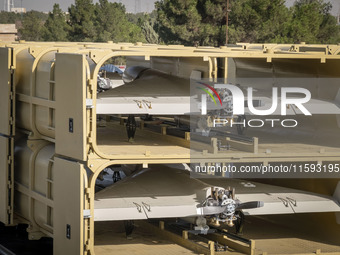 Iranian-made unmanned aerial vehicles (UAV), the Shahed-136, are carried by a truck during a military parade commemorating the anniversary o...