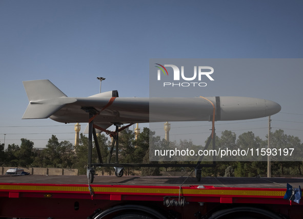 An Iranian-made unmanned aerial vehicle (UAV), the Shahed-136, which is equipped with a jet engine, is carried by a truck during a military...