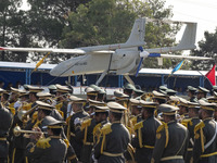 An Iranian-made unmanned aerial vehicle (UAV) is carried by a truck during a military parade commemorating the anniversary of the Iran-Iraq...