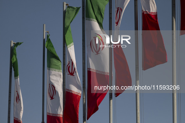 Iranian flags wave in the wind during a military parade commemorating the anniversary of the Iran-Iraq War (1980-88) outside the Khomeini Sh...