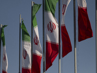 Iranian flags wave in the wind during a military parade commemorating the anniversary of the Iran-Iraq War (1980-88) outside the Khomeini Sh...