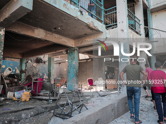 A picture shows the destruction caused by an Israeli army attack on the Al-Falah school where Palestinians take shelter, killing and woundin...