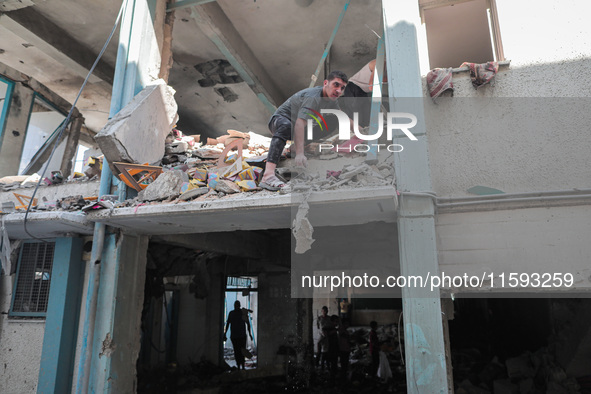 A picture shows the destruction caused by an Israeli army attack on the Al-Falah school where Palestinians take shelter, killing and woundin...